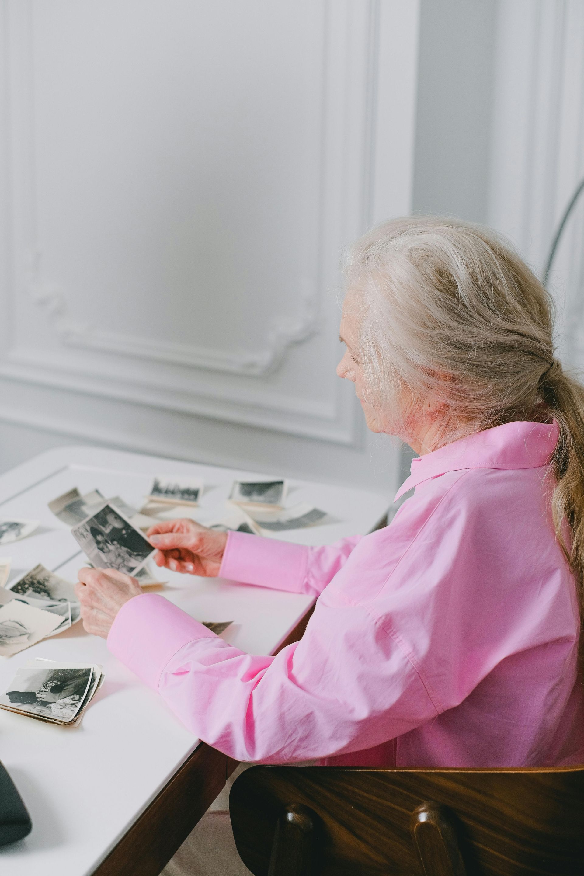 woman sorting through photos