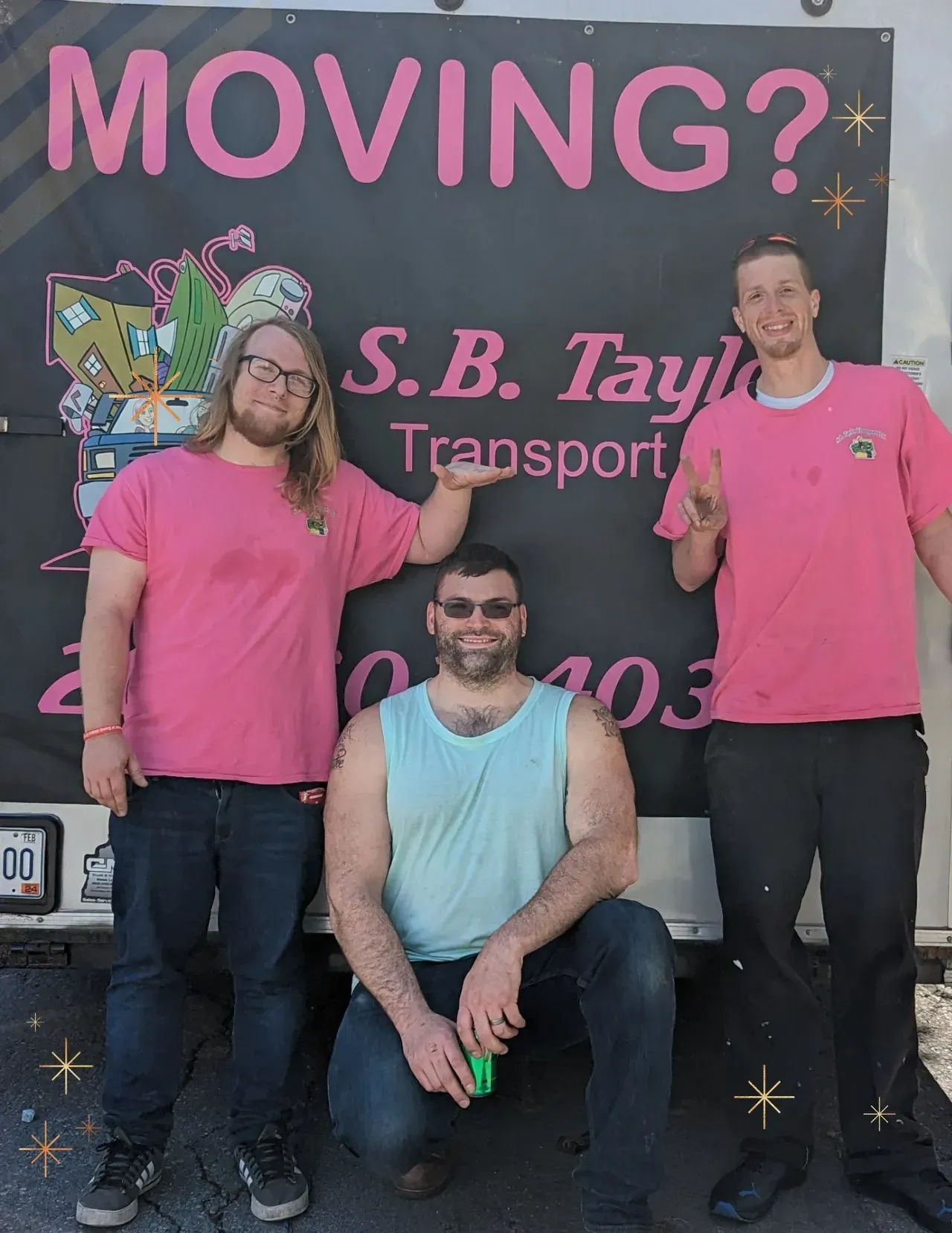 Three men standing in front of a sign that says moving