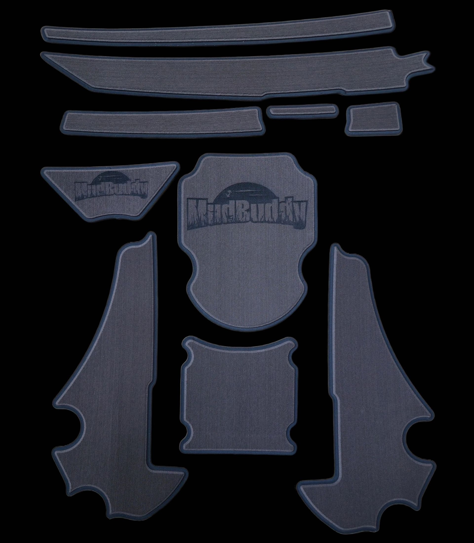 Blue-gray garment pattern pieces laid out on a black background