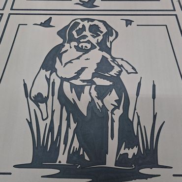 Black dog standing in tall grass with birds flying overhead, stencil-style artwork