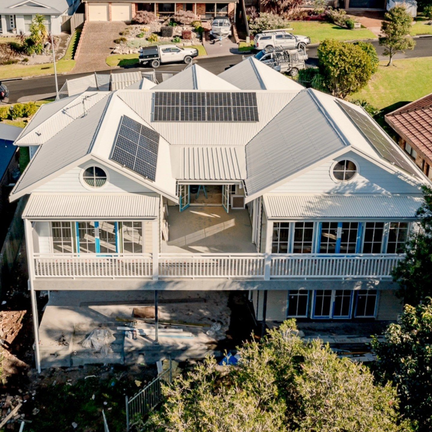 Aerial View of A White Two Story House with A Metal Roof — QBC Constructions In Gerringong, NSW