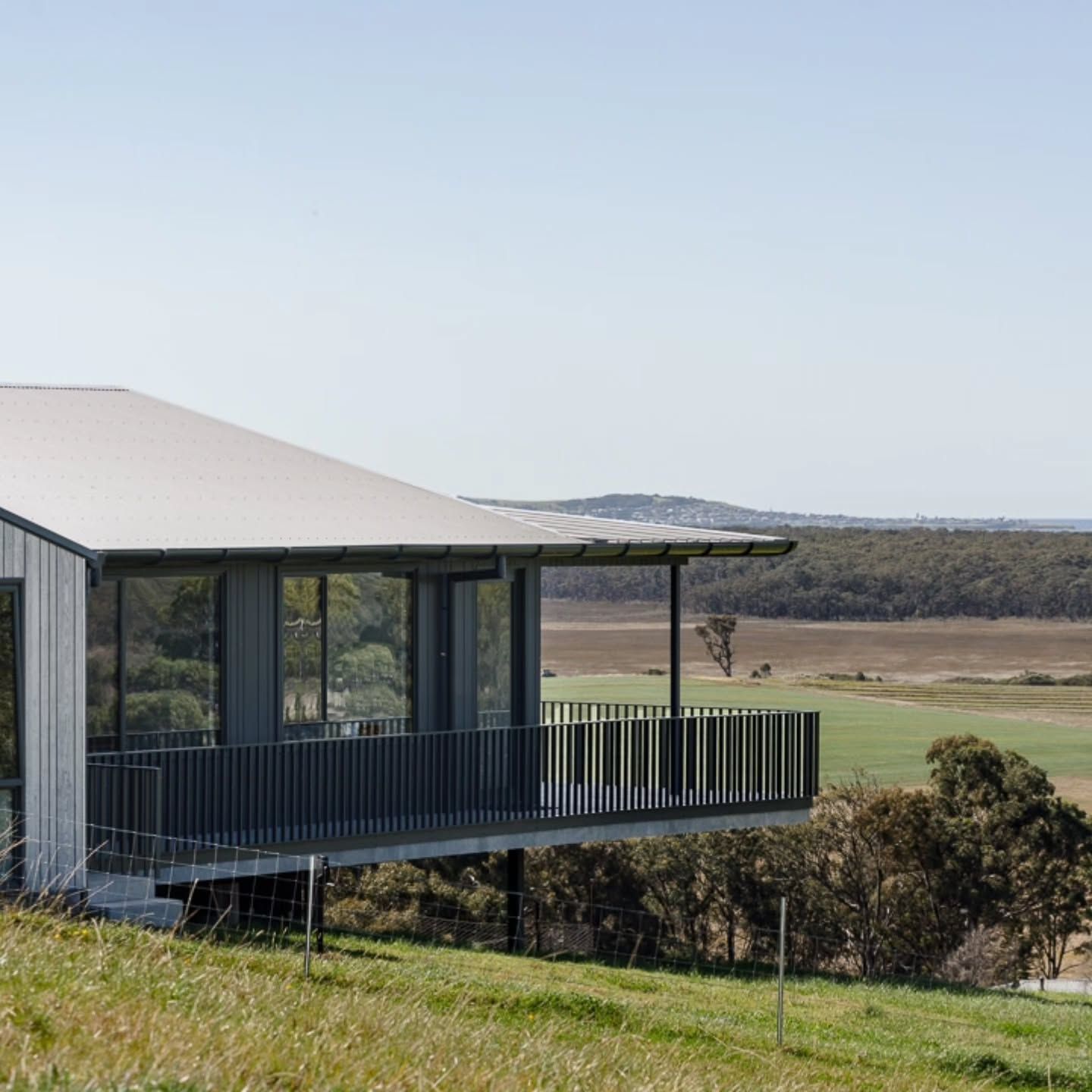 Modern House with A Balcony Overlooking Open Fields — QBC Constructions In Gerringong, NSW