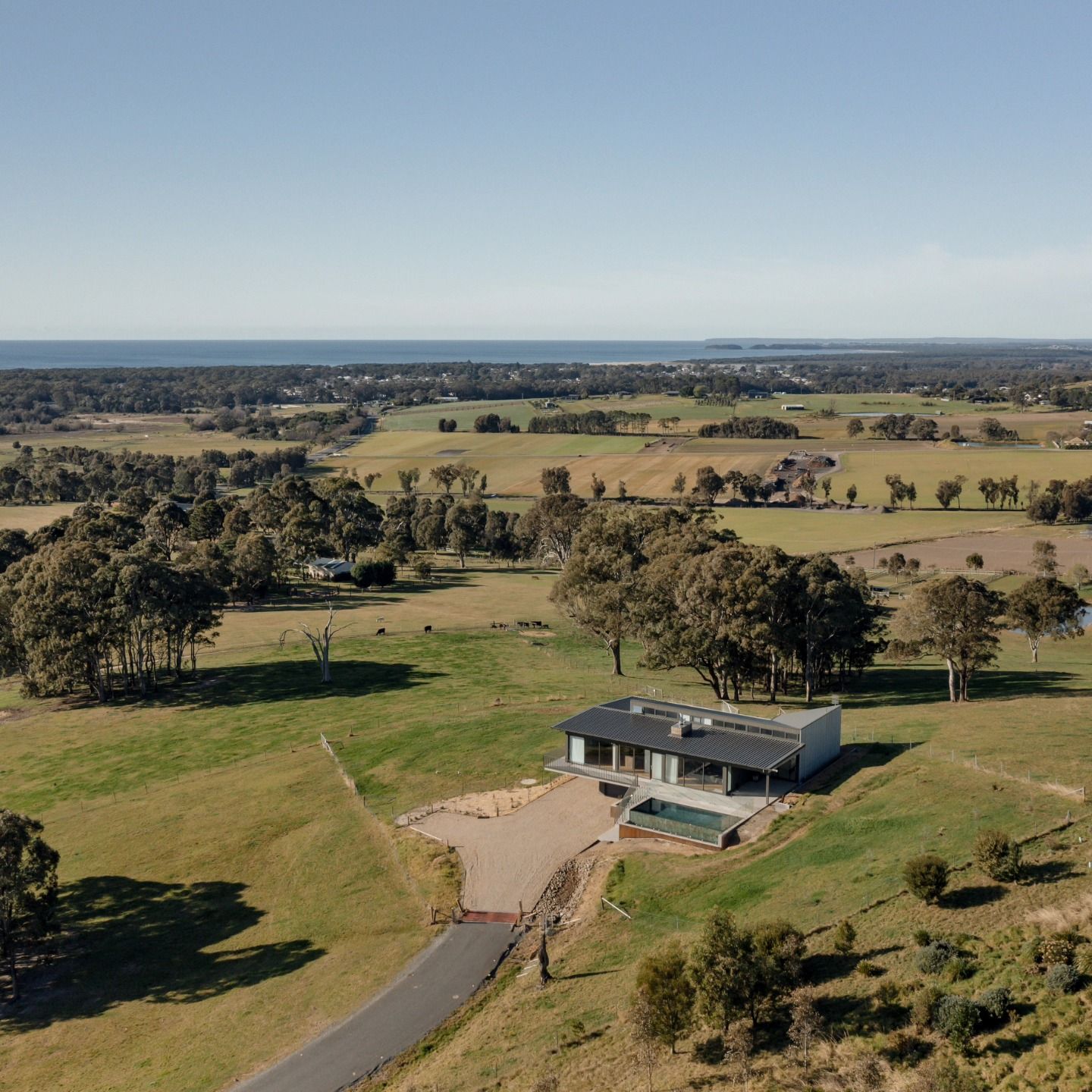 Aerial View of A Rural House with A Driveway and Scattered Trees — QBC Constructions In Gerringong, NSW