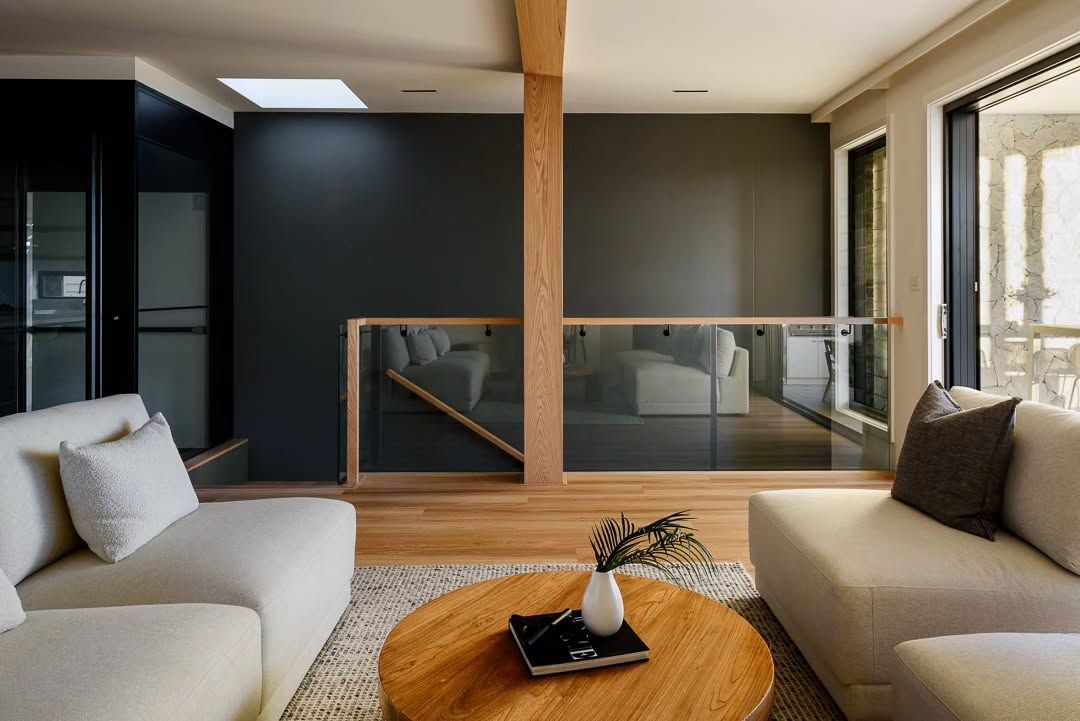 Modern Living Room with White Sofas and Round Wooden Table — QBC Constructions In Gerringong, NSW