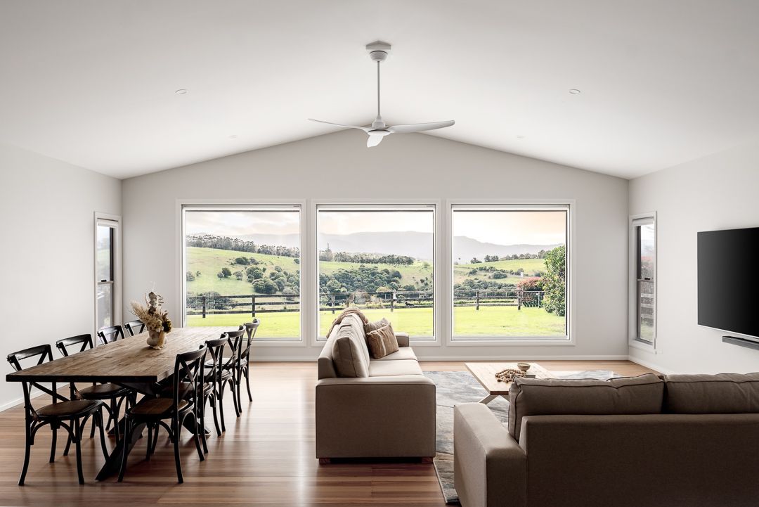 Bright Modern Living Room with Gray Sofas — QBC Constructions In Berry, NSW