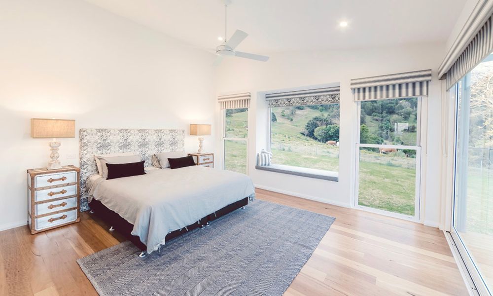 There is a Large Bed in the Middle of the Room — QBC Constructions In Willow Vale, NSW