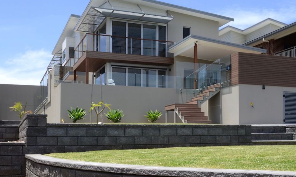 A Large House With Stairs Leading Up to It — QBC Constructions In Gerringong, NSW