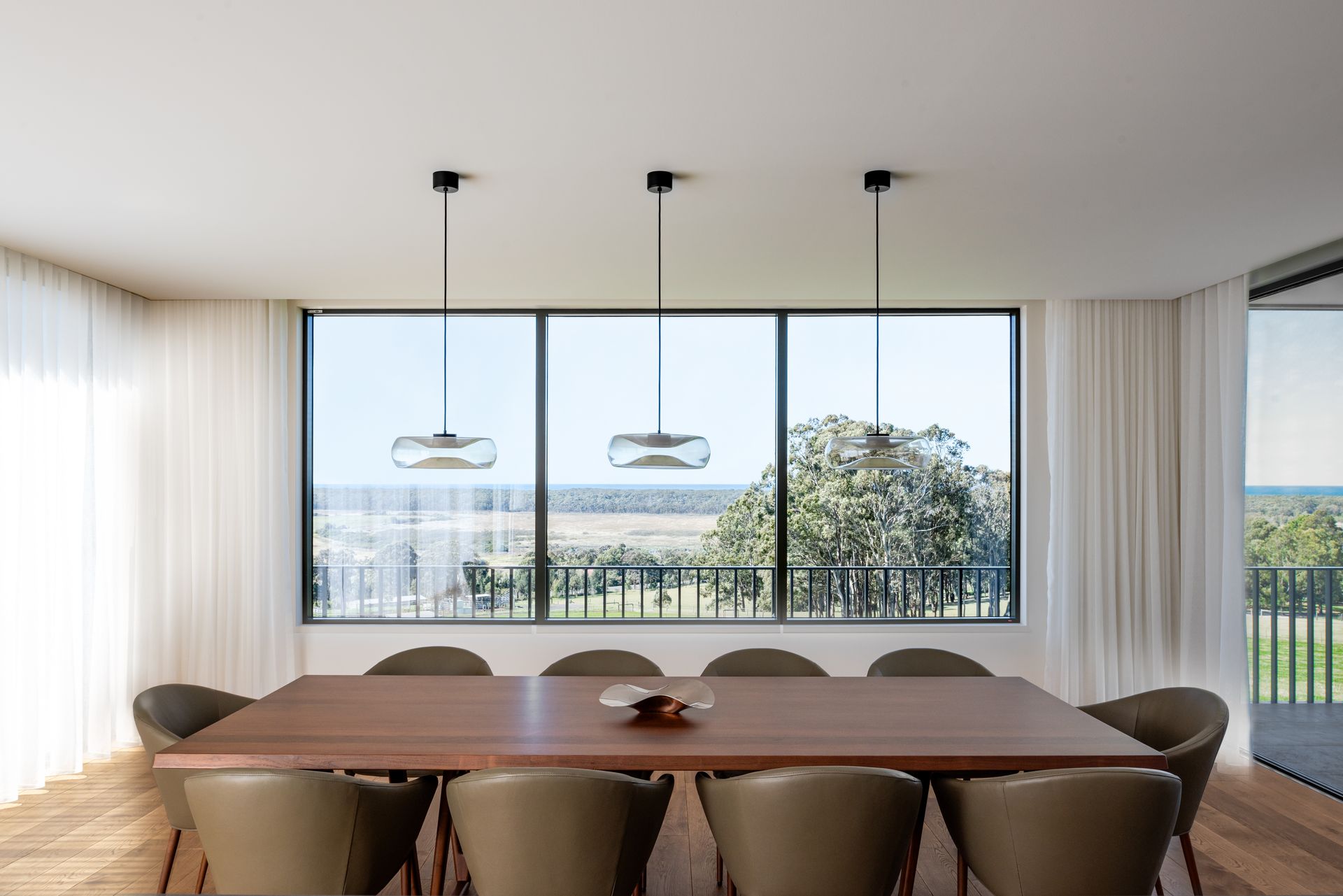 A Dining Room With a Table — QBC Constructions In Seven Mile Beach, NSW