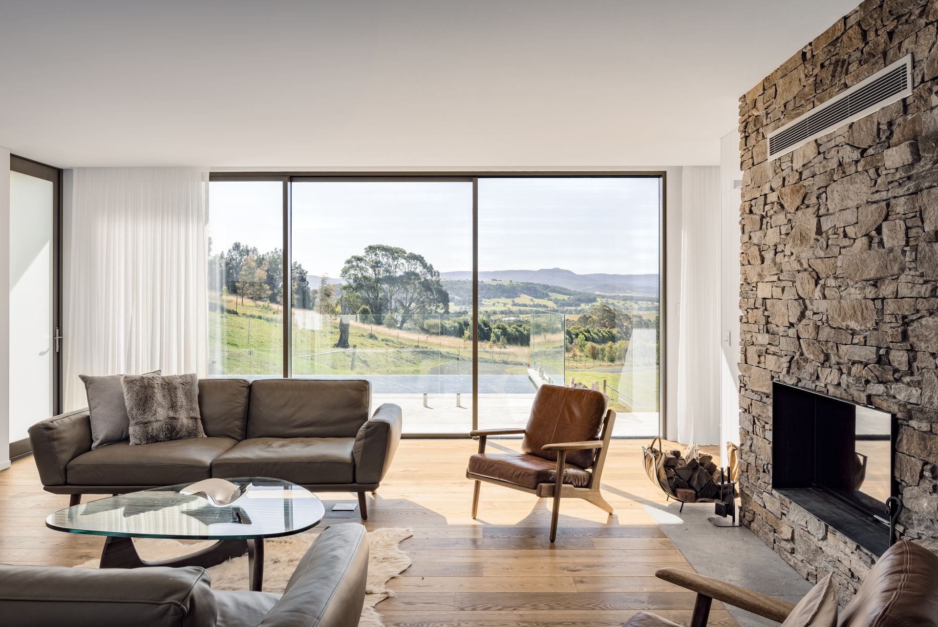 A Living Room With a Couch — QBC Constructions In Seven Mile Beach, NSW