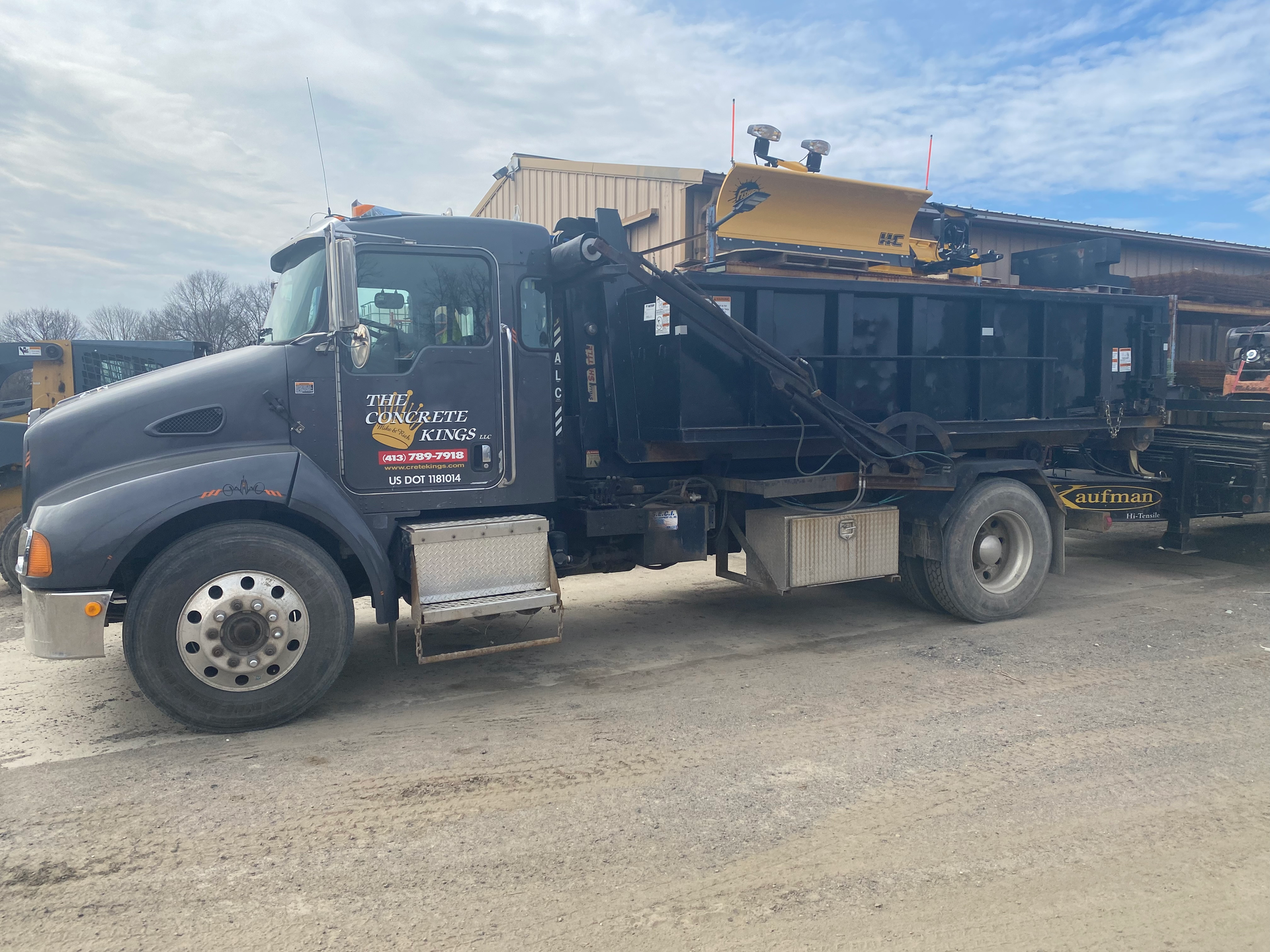 The Concrete Kings dumpster rental truck in Agawam, MA