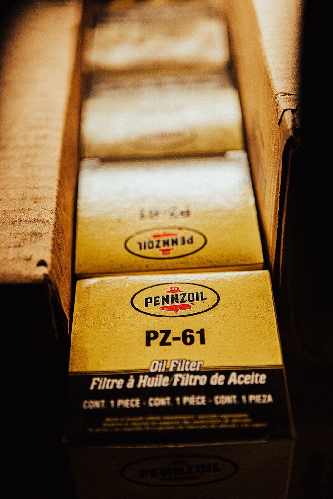 Boxes of Pennzoil PZ-61 oil filters inside a cardboard box.