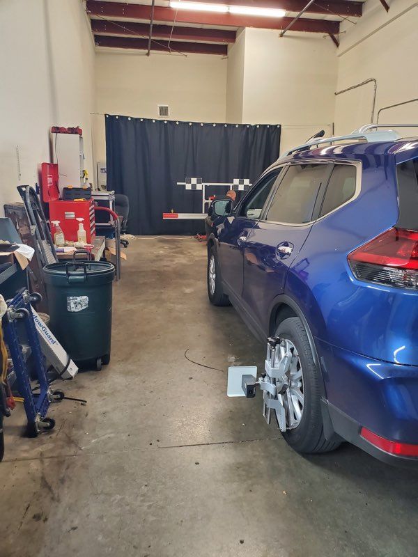Blue Car on Maintenance — Fort Myers, FL — A Plus Auto Glass and Collaborations