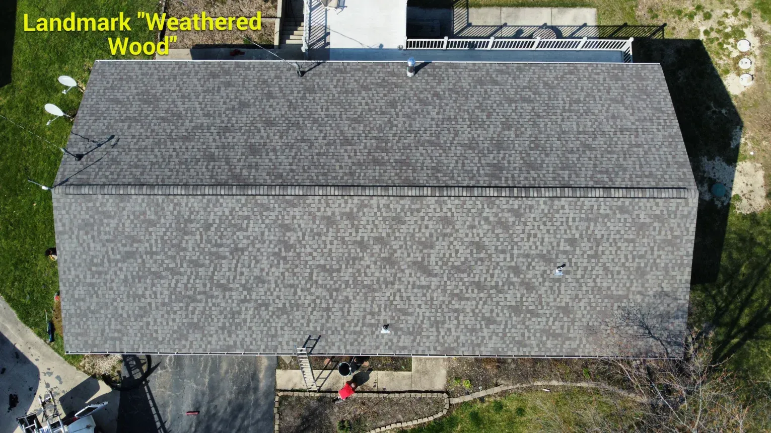 Aerial view of a rectangular house roof with Landmark 