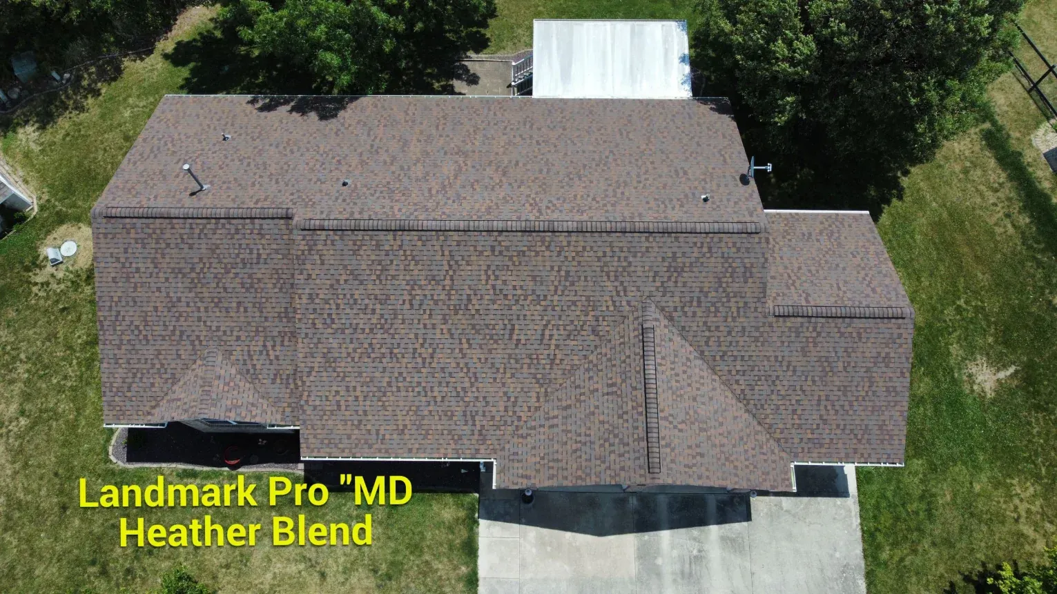 Aerial view of a residential roof featuring Landmark Pro 
