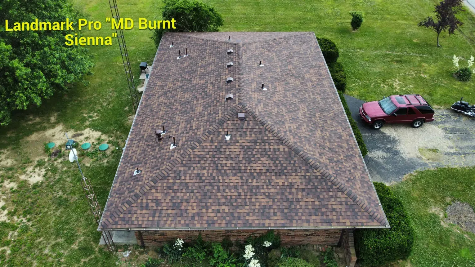 An aerial view of a house roof featuring Landmark Pro 