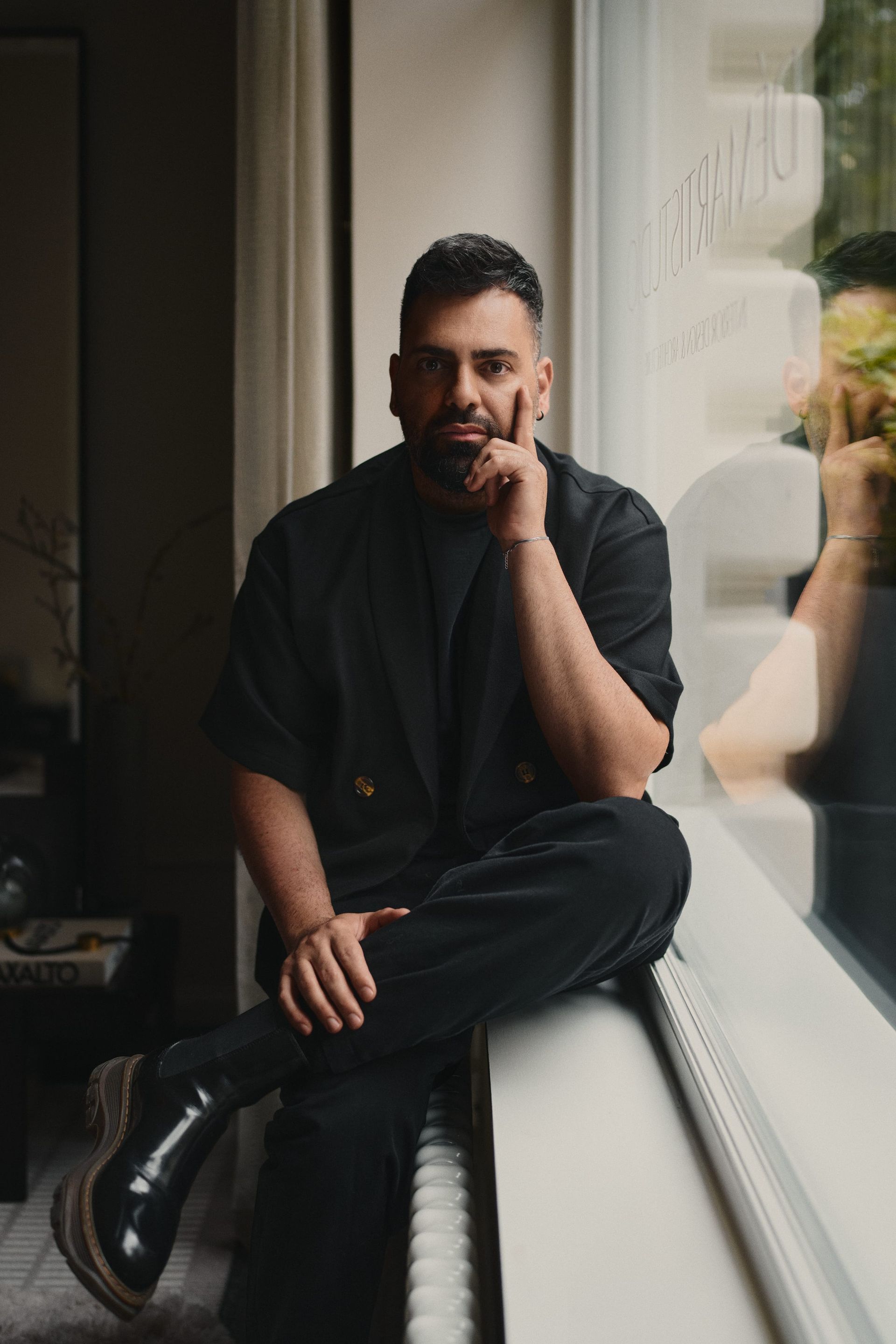 Interior designer Démis Martides at the DÉMARTISTUDIO showroom in Berlin