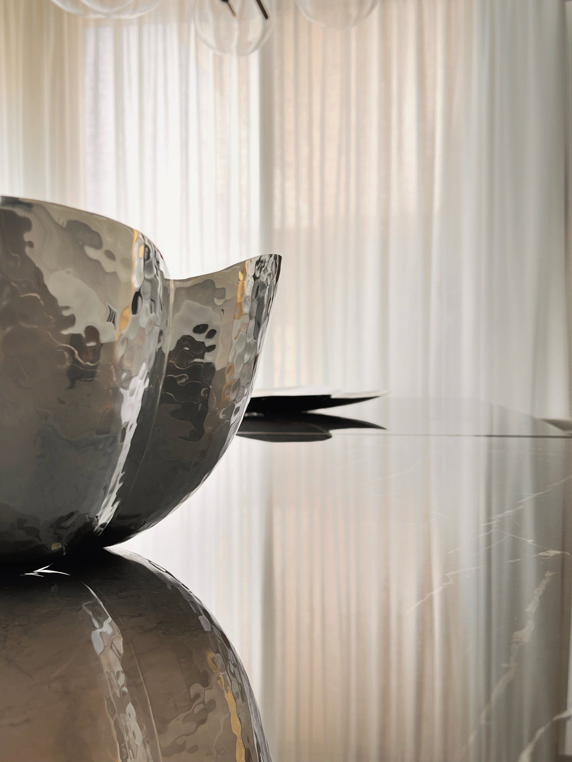 Premium interior styling featuring custom furnishings, textiles and natural daylight