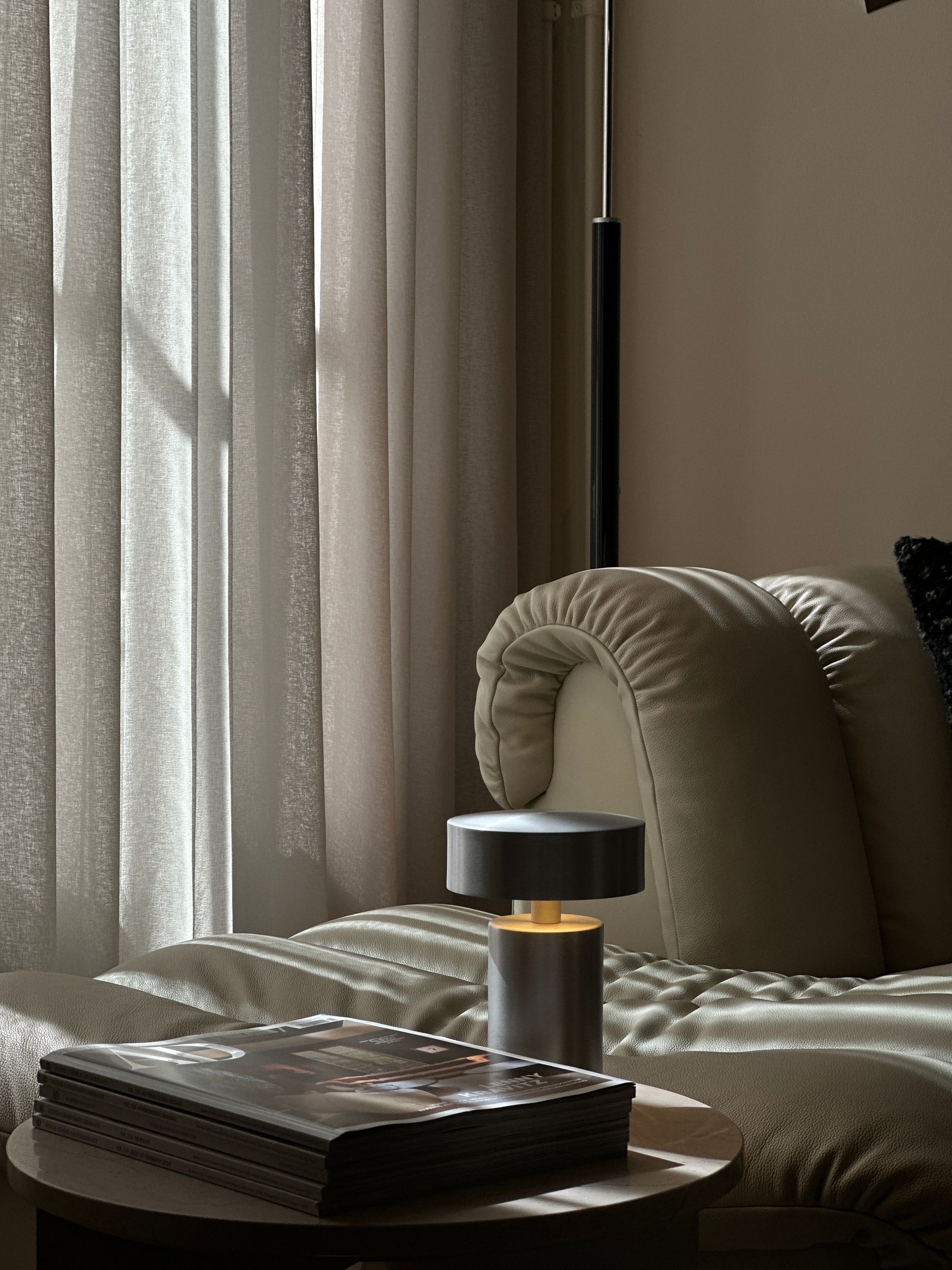 Luxury curtain fabrics and bespoke interior detailing in a contemporary living space