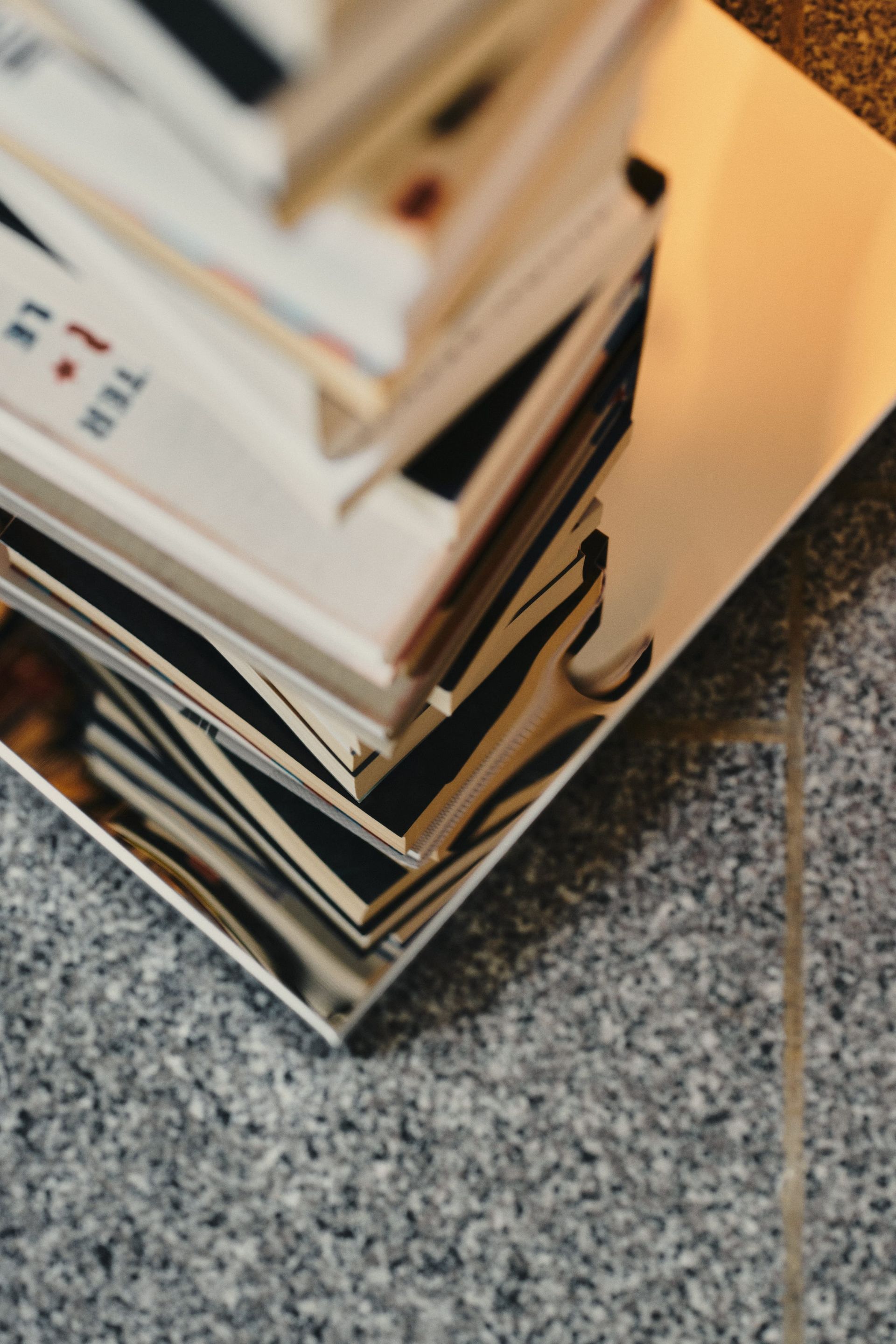 Interior design books and material samples displayed at the DÉMARTISTUDIO Berlin showroom