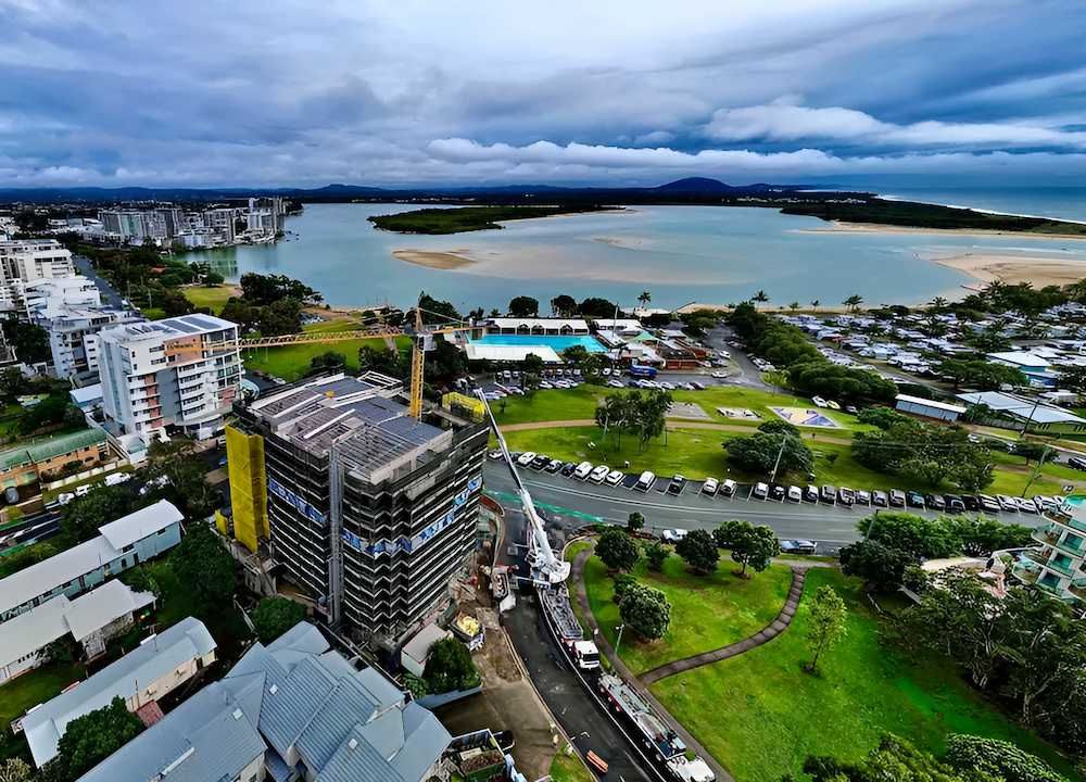 An Aerial View of a City With a Large Body of Water in the Background — All Coast Scaffolding In Yandina, QLD