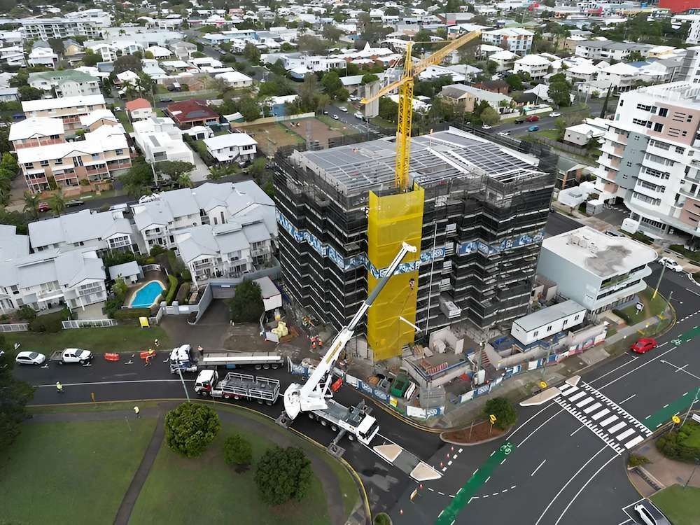 An Aerial View of a Building Under Construction in a City — All Coast Scaffolding In Yandina, QLD