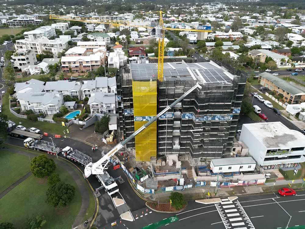 An Aerial View of a Building Under Construction in a City — All Coast Scaffolding In Yandina, QLD
