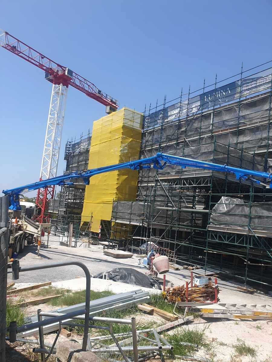 Construction Site With Scaffolded Building — All Coast Scaffolding In Alexandra Headland, QLD