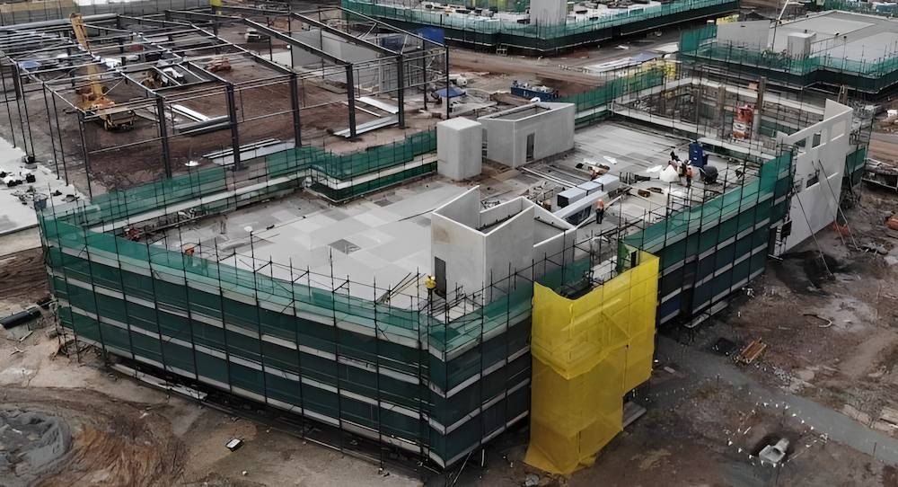 An Aerial View of a Large Building Under Construction — All Coast Scaffolding In Yandina, QLD