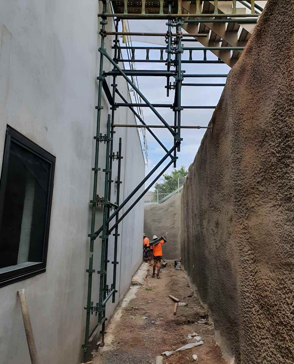 Workers In Orange Vests On Scaffolding — All Coast Scaffolding In Noosa, QLD