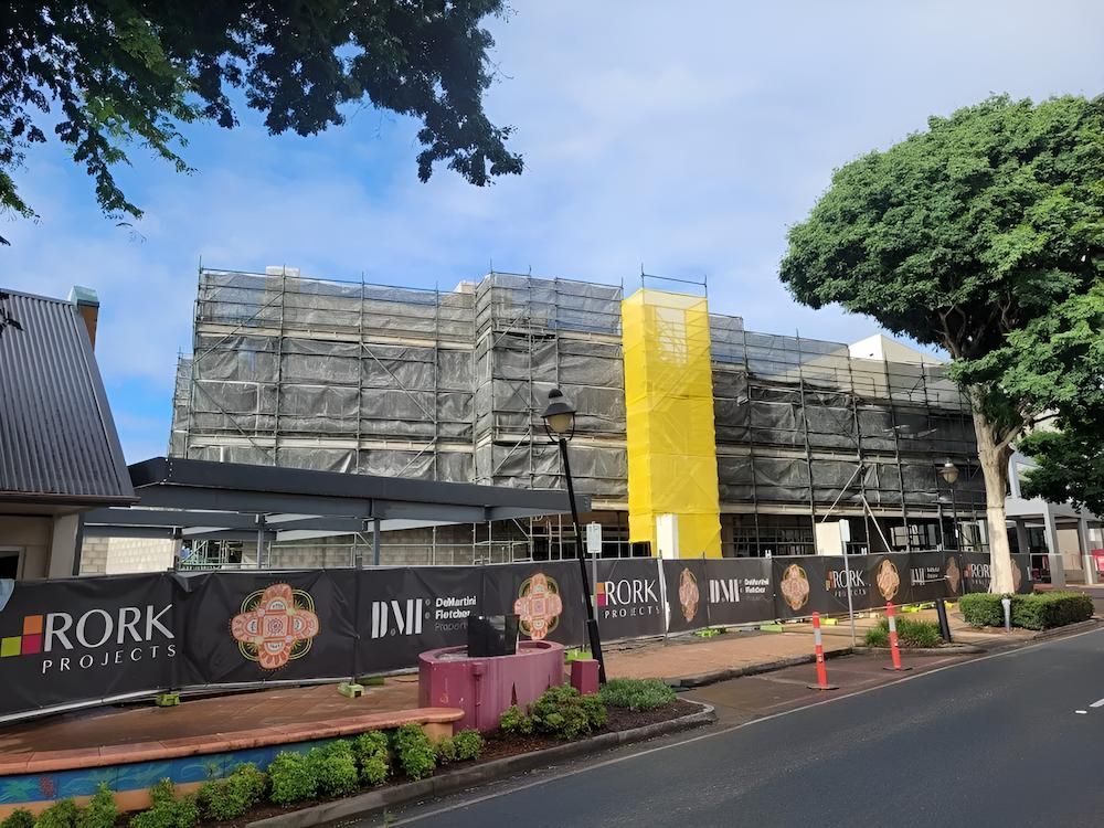 A Large Building is Being Built With Scaffolding Around It — All Coast Scaffolding In Yandina, QLD