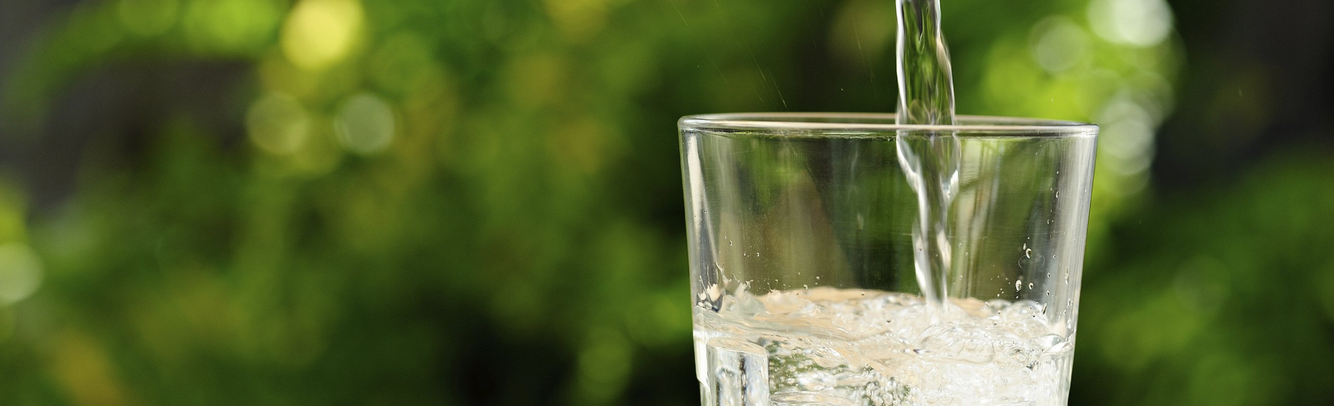 Filtered Water Being Poured Into a Glass