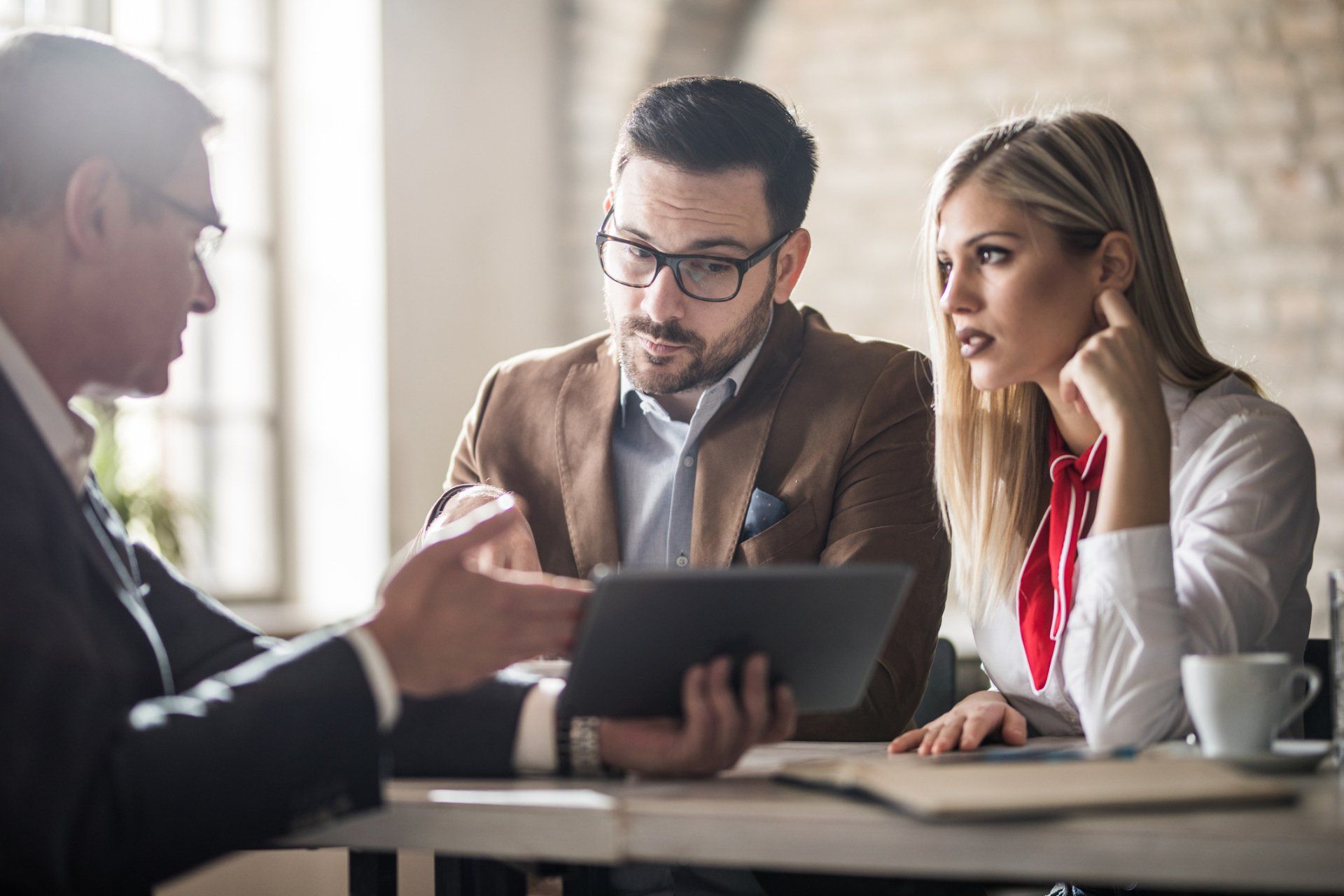 Accountant Explaining to Clients — Newcastle, NSW — Neil C Hocquard