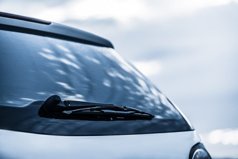 A Close Up of a Car Windshield With a Wiper on It — Rod's Total Tint In Rutherford, NSW