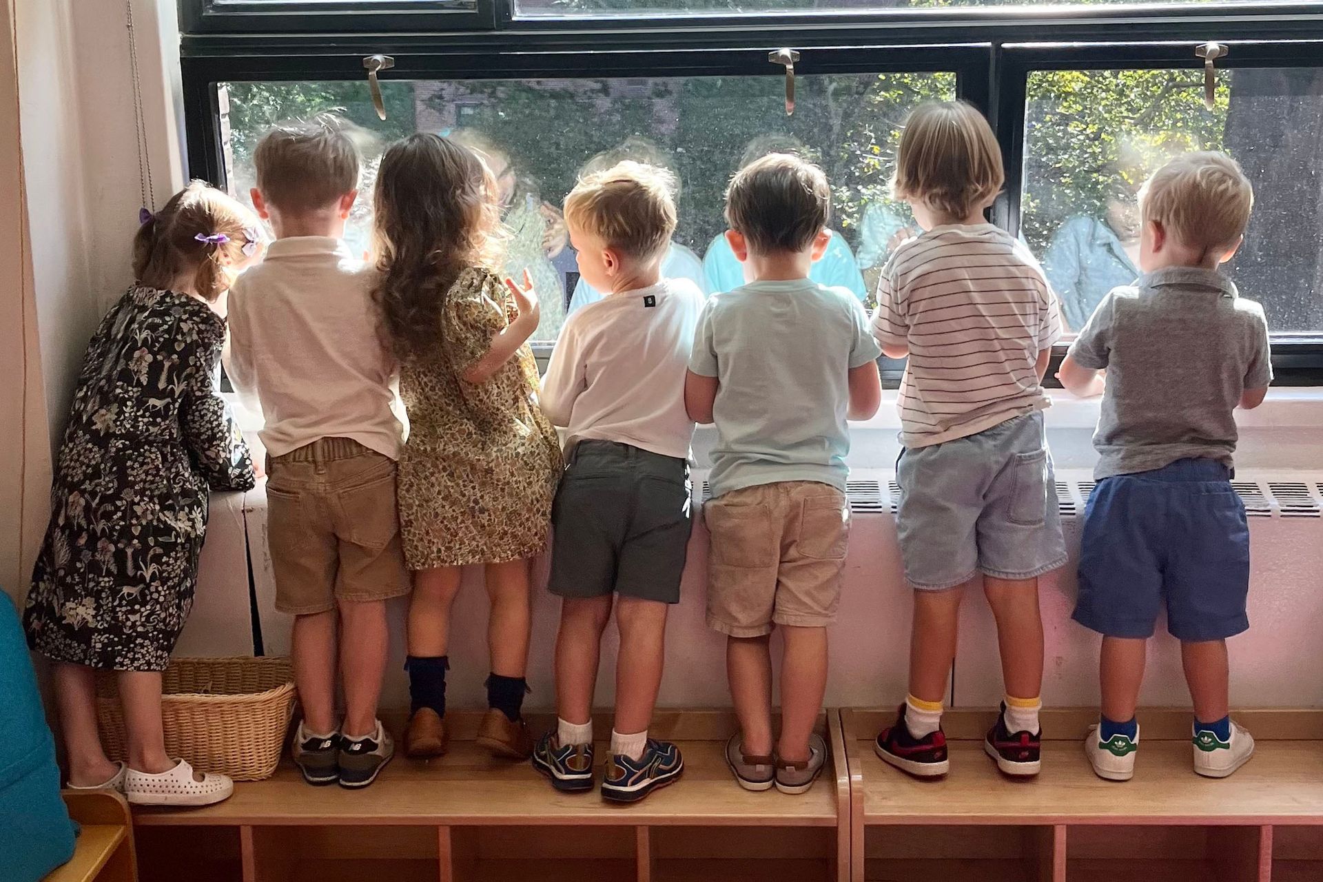 Kids looking out the window