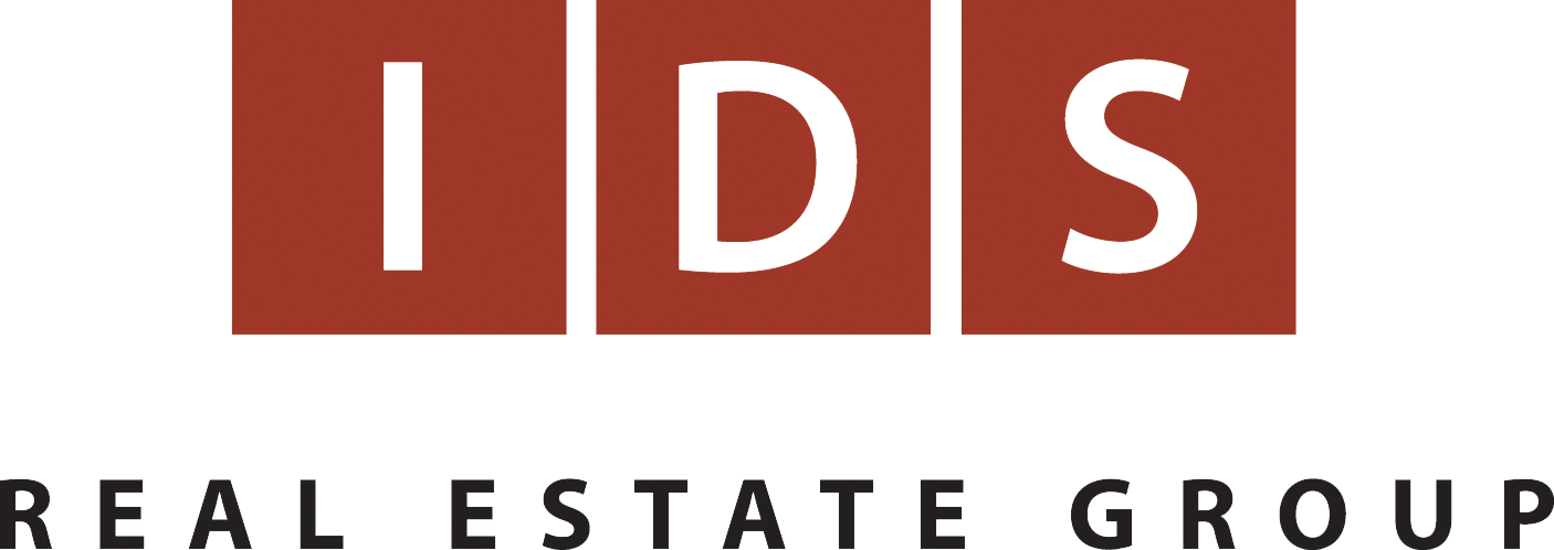 The logo for ids real estate group is red and white.