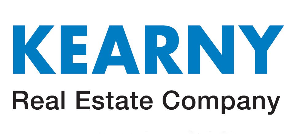 The kearney real estate company logo is blue and white on a white background.