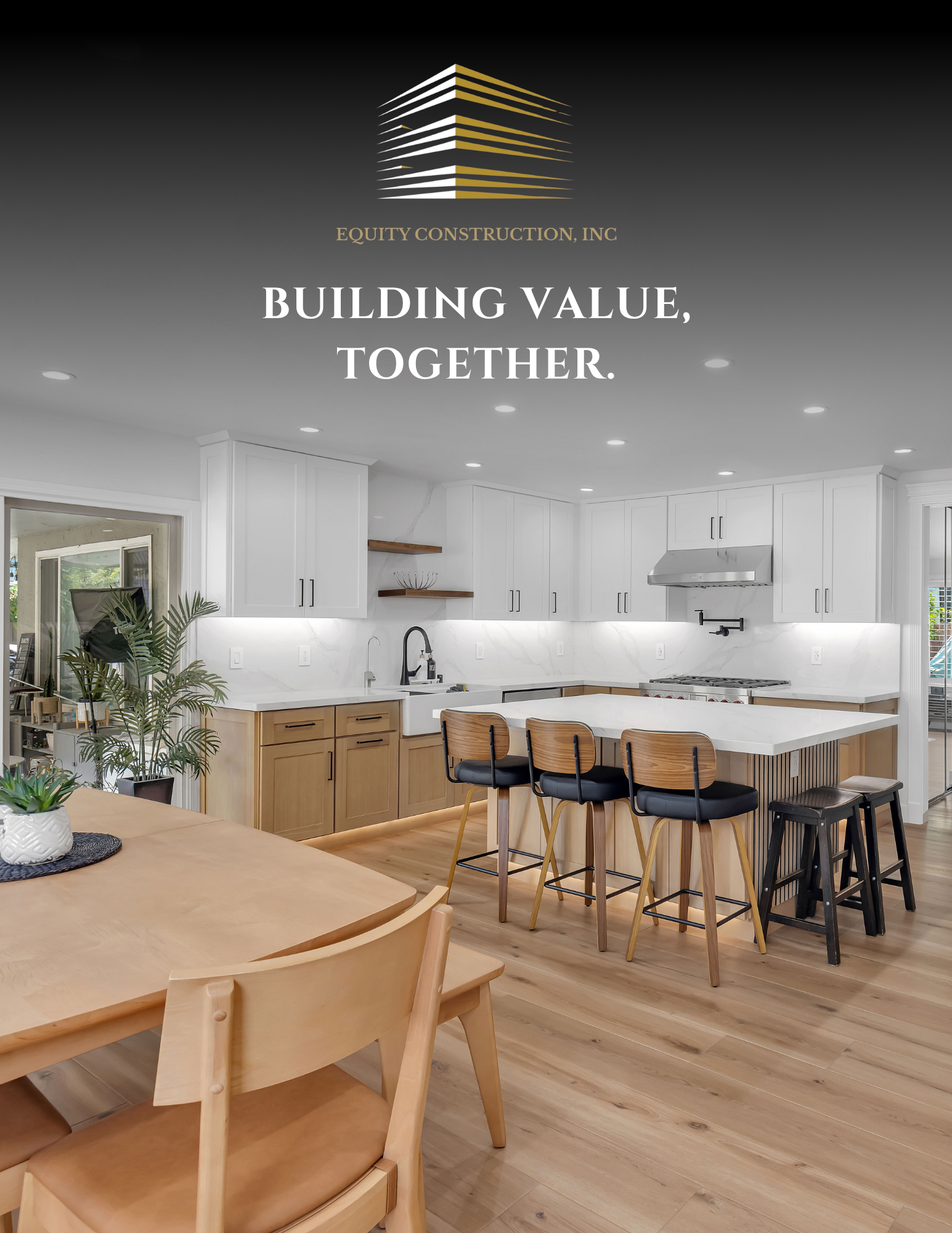 Modern kitchen and dining area with wood finishes and the text “Building value, together.”
