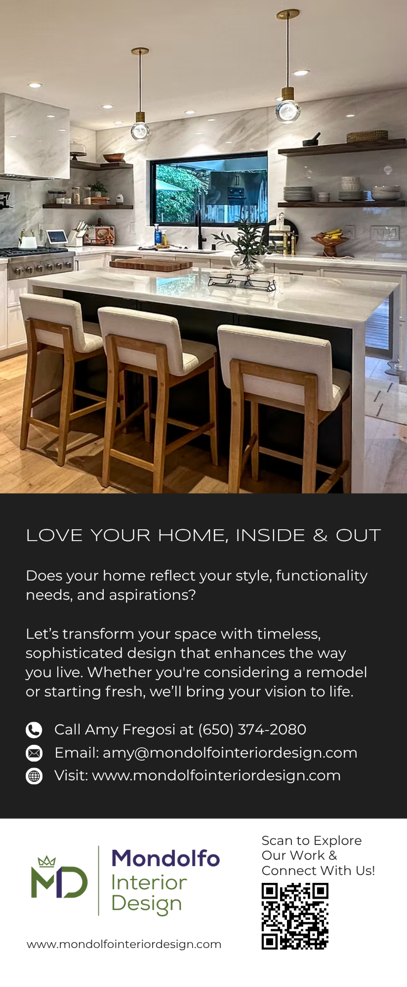 Bright modern kitchen with island seating, pendant lights, and large window over the sink.