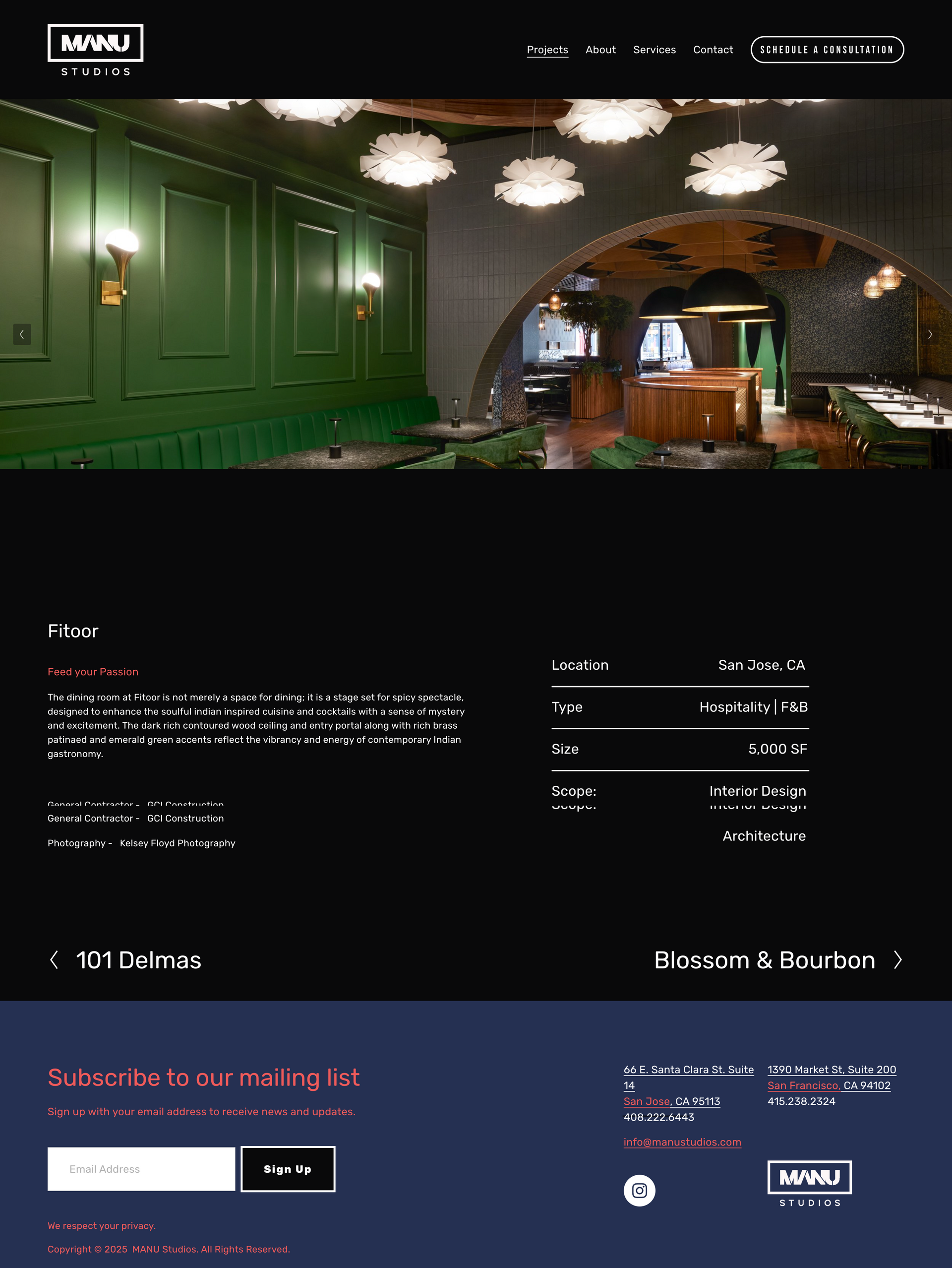Restaurant interior with green paneled wall, arched stone bar, and pendant lights on a dark webpage layout