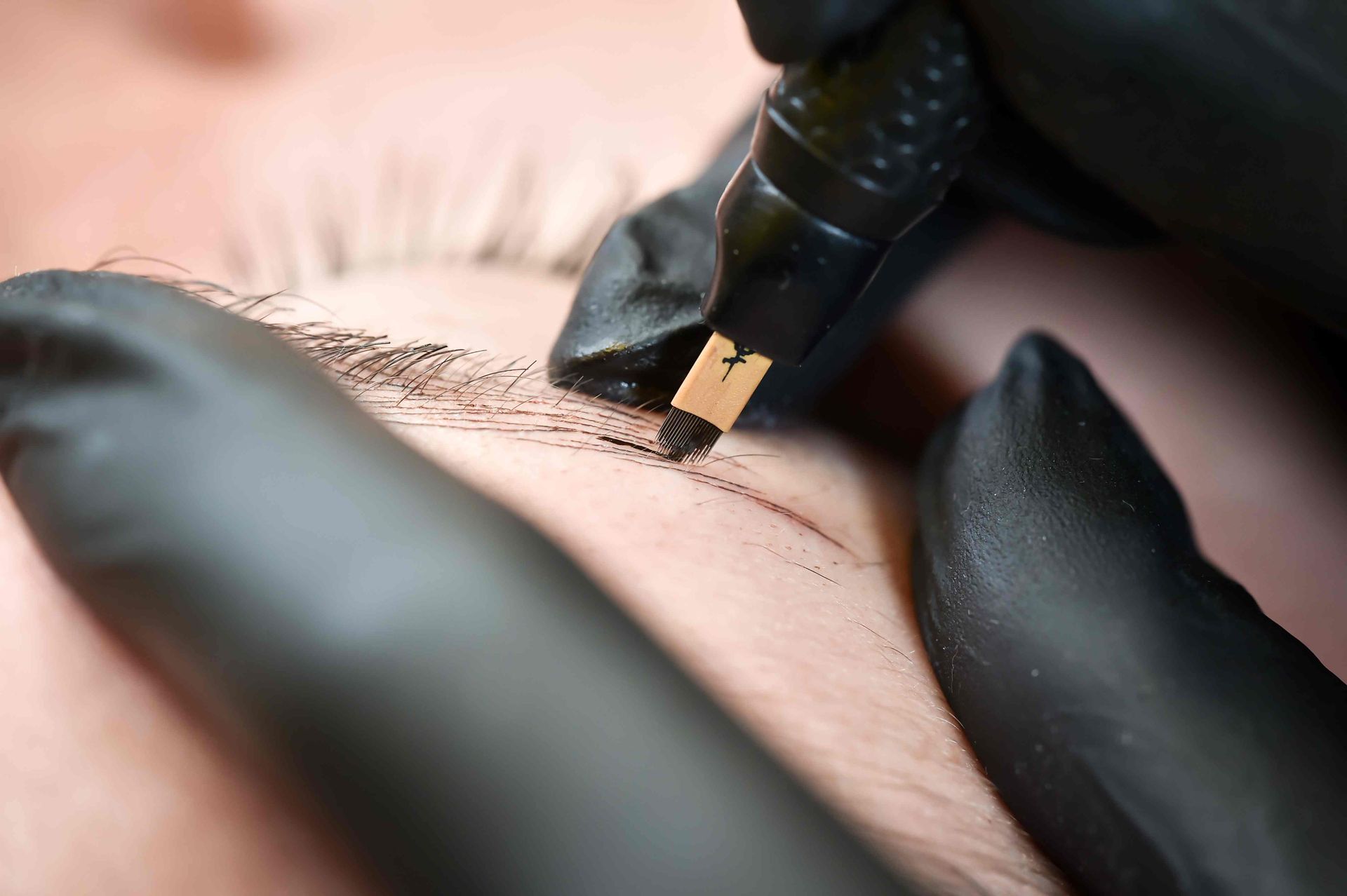 Close-up image of someone getting microblading at Lexington Tattoo Removal near Lexington, KY