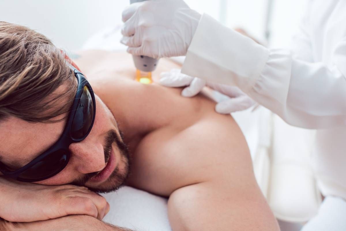 Someone receiving a laser hair removal treatment near Lexington, Kentucky (KY)