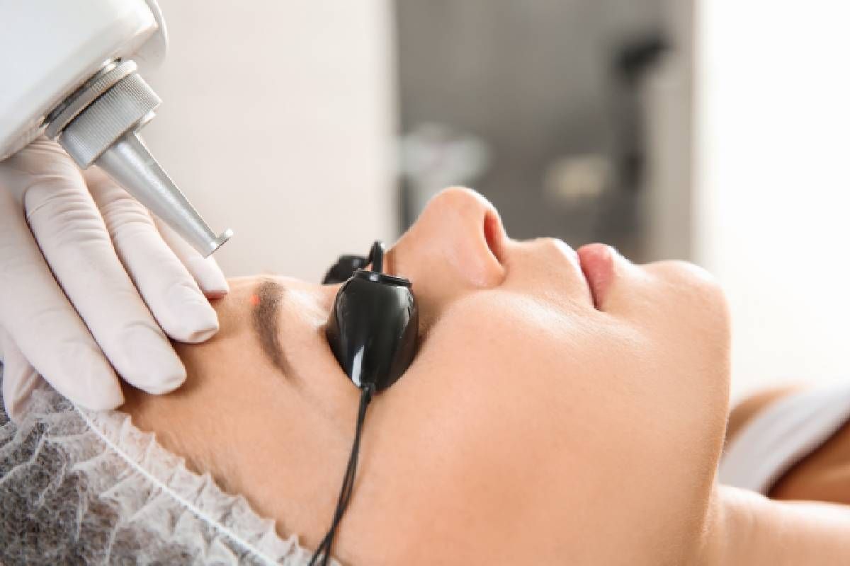 A patient receiving laser microblading removal services near Lexington, Kentucky (KY)