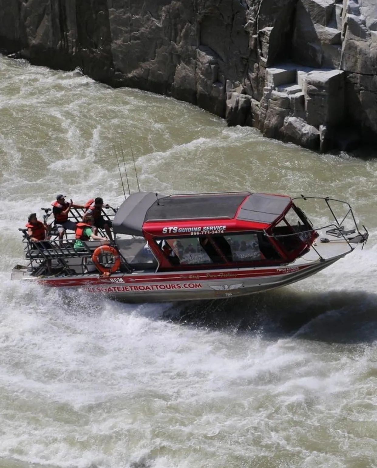 A boat that has the word national on it