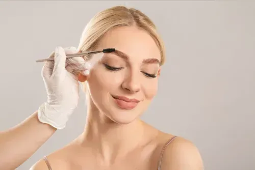 Person Getting Eyebrow Makeup Applied — Aqua Marine Skin and Beauty in Tuncurry, NSW