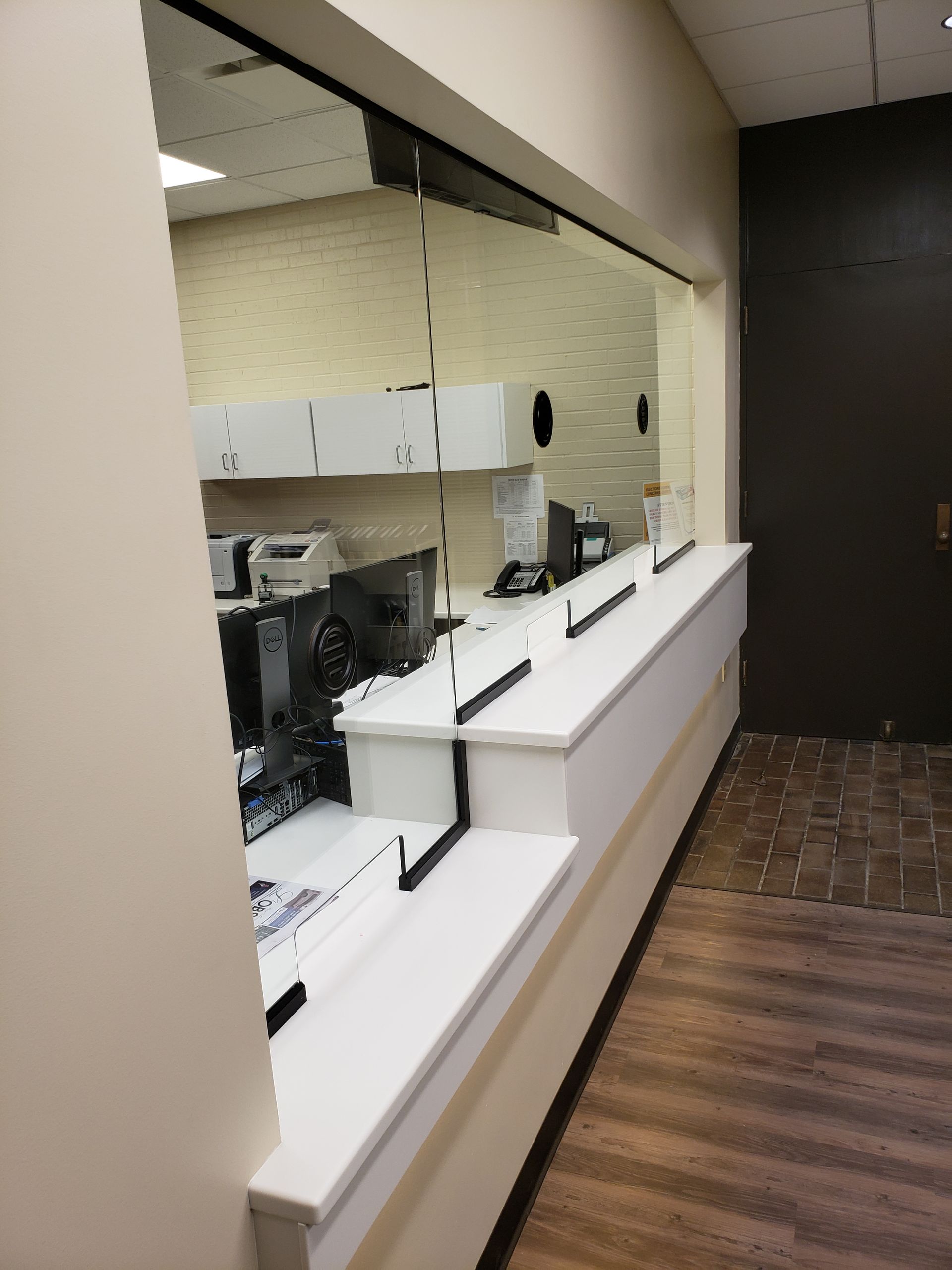 A row of counters in a room with a large window