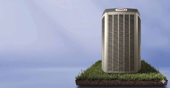 Une unité de climatisation sur le toit d'une plateforme herbeuse, se détachant sur un ciel bleu.