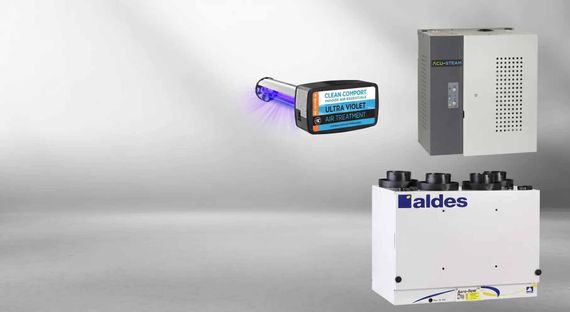 Machine industrielle blanche avec un composant éclairé en bleu et une unité de commande grise sur fond uni
