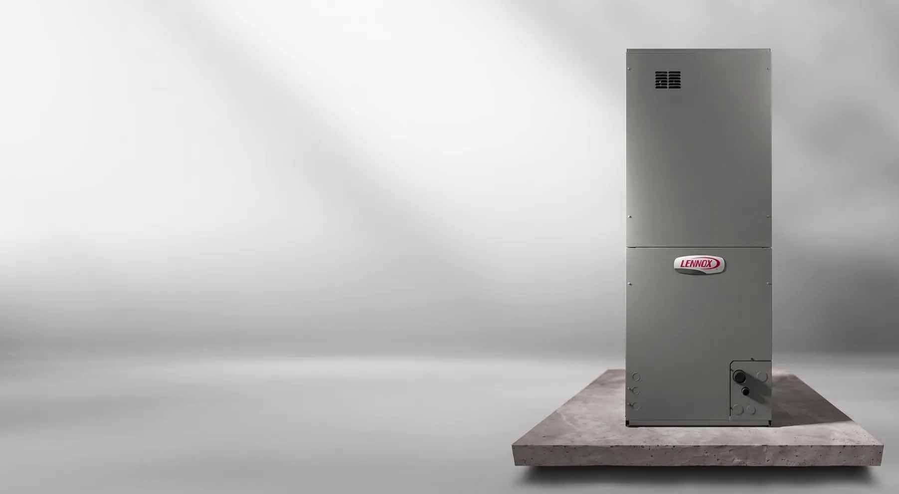 Gray metal industrial cabinet on a wooden platform against a plain light-gray background.