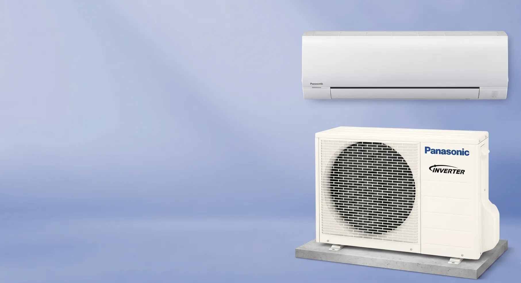 Wall-mounted white air conditioner above an outdoor condenser unit on a blue gradient background