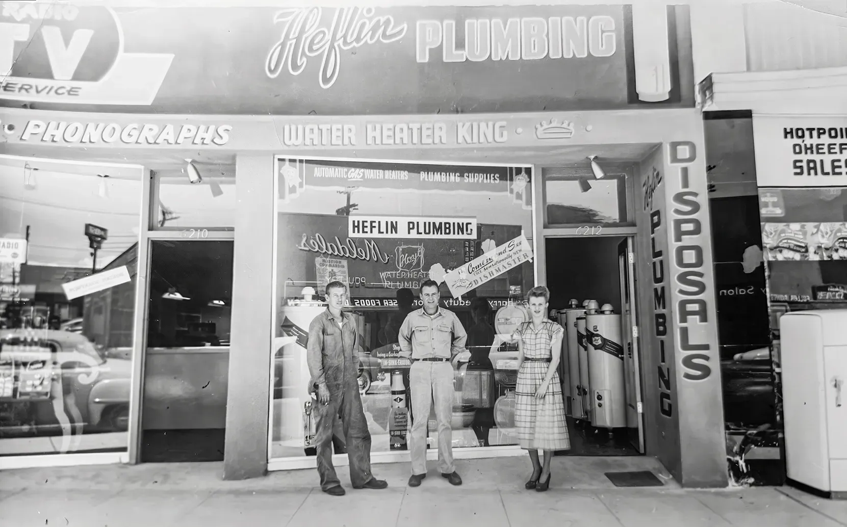 Historic photo of the Heflin Plumbing storefront and team during the company's early years in Los Angeles.